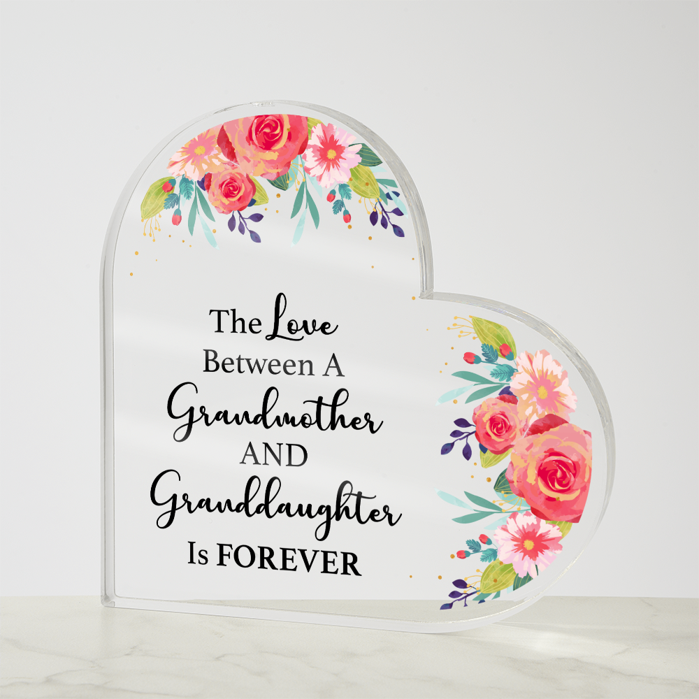 The Love Between a Grandmother and Granddaughter Is Forever – Heart-Shaped Acrylic Plaque • Floral Keepsake Decor • Meaningful Gift from Grandma