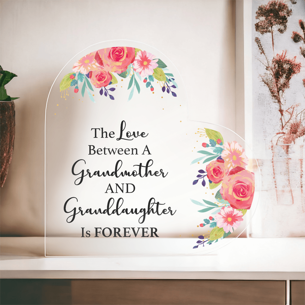 The Love Between a Grandmother and Granddaughter Is Forever – Heart-Shaped Acrylic Plaque • Floral Keepsake Decor • Meaningful Gift from Grandma